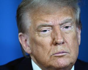 United States President Donald Trump looks on during the two-day Nato summit of heads of state...