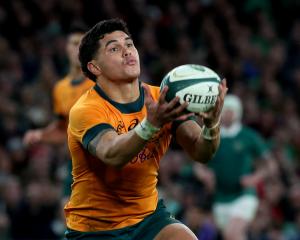 First-choice flyhalf Noah Lolesio is out with a neck injury. Photo: Reuters 