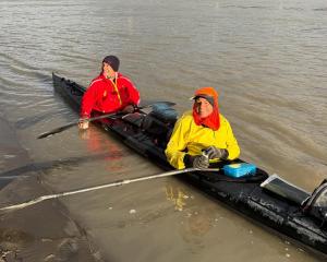 Bob McLachlan (right) and Gordon Townsend celebrate victory in the Yukon 1000 kayak race. PHOTO:...
