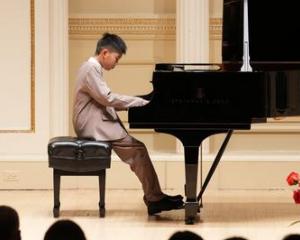 Edison&nbsp;performing Mazurka in A minor in front of hundreds at New York’s famed Carnegie Hall​...