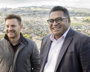 Insurance Council of New Zealand chief executive Kris Faafoi (right) visits St Clair in Dunedin...