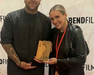 Invisible Dragons co-producer Madison Henry-Ryan and writer/director Victoria Boult after winning...