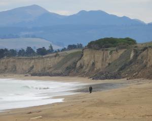 The sea incursion is now within metres of the edge of the scenic Beach Rd, just south of Oamaru....