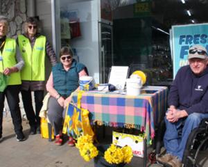 L to R: Bernie Cournane-Co-Organiser of Fiordland Daffodil Day, Natalie Shanks-Volunteer and Te...