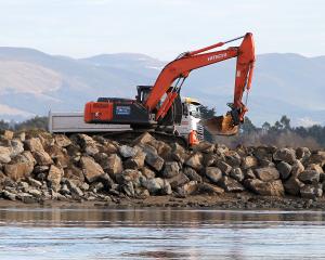 Otago Regional Council rearranging its groyne at the Inch Clutha River mouth, after flooding in...