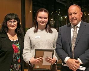 Maddie Grinton, 18, with councillor Gaynor Finch and former mayor Bryan Cadogan after receiving...