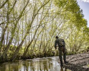 Southland Fish &amp; Game senior officer Cohen Stewart out fishing recently in Southland. PHOTO:...