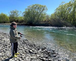 Jackson Collins, 15, of Oamaru, fishes the Waitaki River near Kurow. PHOTO: BLAKE HARPER/FISH ...