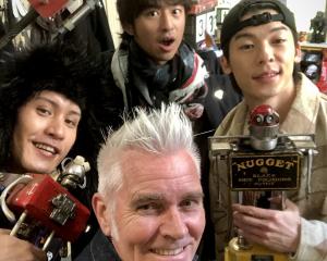 Taiwanese television stars (back from left) Huang Hsuan (stage name Yellow), Chen Po-lin and Greg...