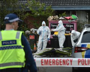Police at the scene in North Dunedin on Friday afternoon. PHOTO: GREGOR RICHARDSON
