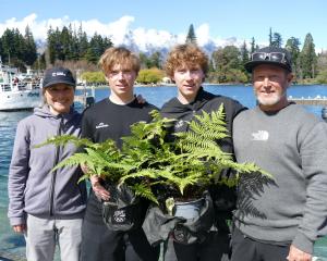 Twins Cam, left, and Fin Melville Ives, 19, of Wanaka, with their parents, Karen and Neil, after...