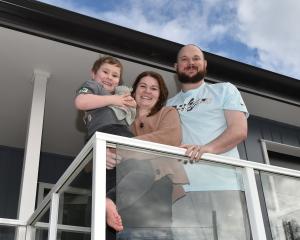 Dunedin family (from left) Henry, Bri and Brayden Soper are settling into their new Abbotsford...