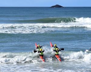 About 40 lifeguards take to the water at St Clair Beach on Saturday for St Clair Lifesaving Club...