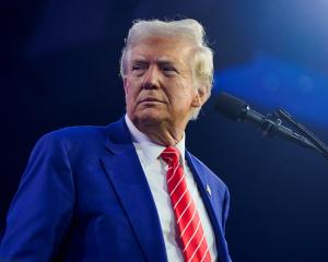 US President-elect Donald Trump attends Turning Point USA's AmericaFest in Phoenix, Arizona....