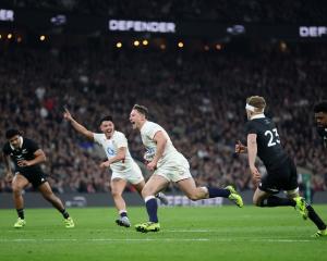 England's Fraser Dingwall runs in to score against the All Blacks. Photo: Reuters