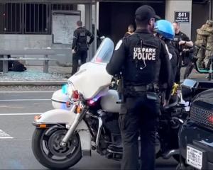 Officers at the scene where two members of the National Guard were shot at in Washington DC in...