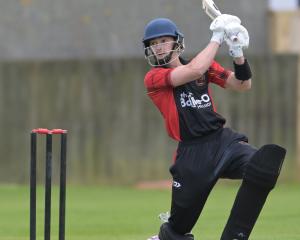 Albion opener Hugo Bogue flogs another boundary during a premier grade game against University...