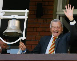 Former umpire Dickie Bird rings the bell ahead of a test match at Lord's cricket ground in London...
