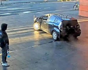 The driver of the car mounted the kerb and did donuts on the forecourt of the bus interchange on...