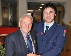 It would not be a hundred years without a cake, with oldest living life member Neville...