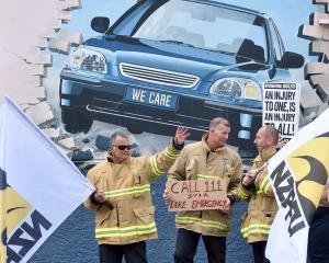 Dunedin senior firefighters (from left) Antony Mason, Tony McEntyre and New Zealand Professional...