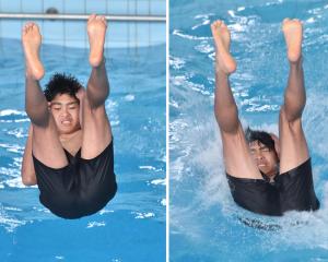 Alkino Adrenata, 12, of Dunedin, makes a splash while competing in the 8-12-year-old category as...