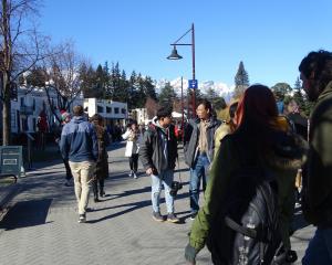 Tourists flock to Queenstown’s lakefront. PHOTO: TRACEY ROXBURGH