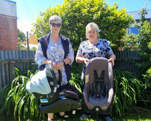 Founding Carseat Trust South Canterbury members Teressa May (left) and Yanni Dijkstra prepare to...