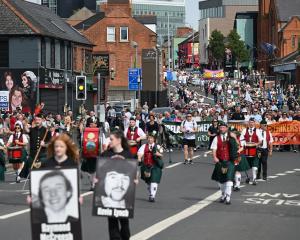 The hunger strikers commemoration march progresses along the Falls Road, Belfast, in August....
