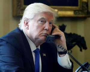 Donald Trump, hard at work peacemaking. PHOTO: REUTERS