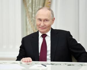 Russian President Vladimir Putin attends a meeting with US President Donald Trump's special envoy...