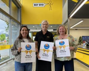 Pak’n Save Queenstown co-owner Michelle King, centre, with Plunket Wakatipu’s Tanya Moffat, left,...