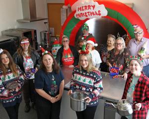 Standing by to cook ‘‘Christmas for the Community’’ in Owaka Community Centre are (from left)...