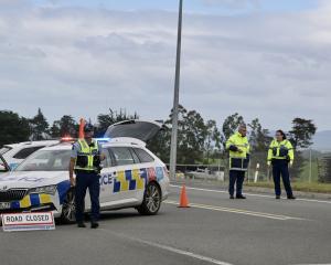 Police at the crash scene on Wednesday. Photo: Gerard O'Brien