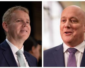 Labour leader Chris Hipkins (L) is preferred prime minister on 45 percent, while National's...