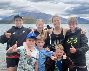 Family friends (back from left) Ollie McCone, 12, Georgia Chilton, 16, Annie Chilton and Harry...