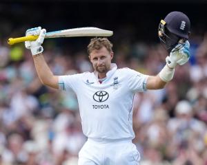 England's Joe Root celebrates after reaching his century at the SCG. Photo: Reuters 
