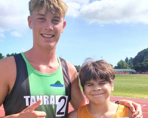 Sam Ruthe and Tamahau Hicks celebrate their 1500m performance in Tauranga. Photo: ...