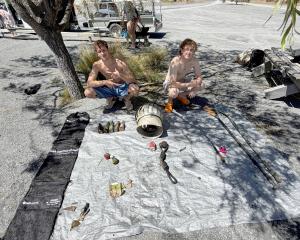 Dive Otago students Gus Bixley (left) and Josh Fleming with some of the loot they secured from...