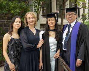 Former University of Otago council member Malcolm Wong with his daughter Eleanor (left), wife...