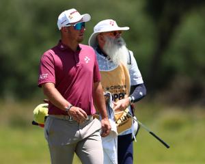 Australian golfer Lucas Herbert (left) and caddie Nick Pugh at The Royal Melbourne Golf Club in...