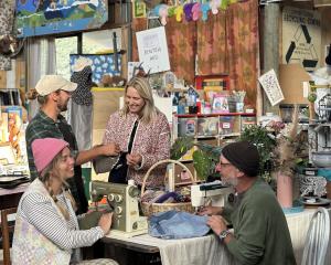 Wastebusters mending club is a place of connection, fixing and skill sharing. From left are Zack...