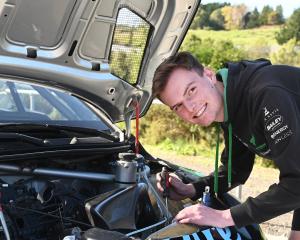 Otago Polytechnic automotive engineering student Dawson Porthouse takes a look under the hood of...
