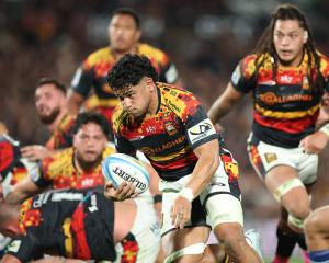 Wallace Sititi of the Chiefs runs in for a try during the round 16 Super Rugby match between...
