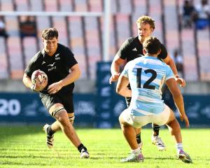 Finn McLeod takes the ball into contact for New Zealand against Argentina in the under 20 Rugby...