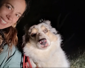 Lauren Moses with Amira after the Border Collie was found. Photo: Supplied