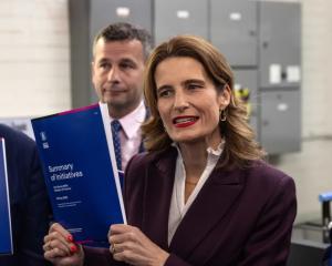 Finance Minister Nicola Willis shows off Budget 2026 ahead of its delivery on Thursday. Photo: RNZ