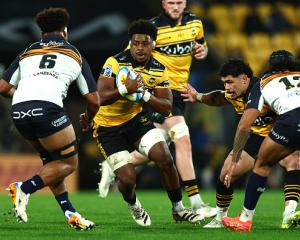 The Hurricanes' Peter Lakai runs the ball up against the Brumbies. Photo: Getty Images