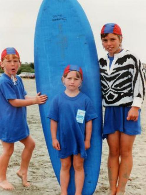 Donovan (right) with fellow junior members of the Sumner Surf Life Saving Club. Photo: Supplied