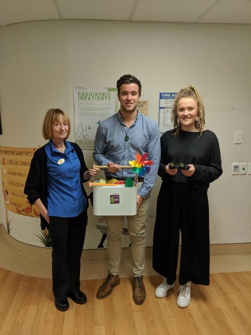 Charge nurse manager Shirley Bell (L), and Starlit Hope volunteers Tom Devine (Gabby's Cousin)...